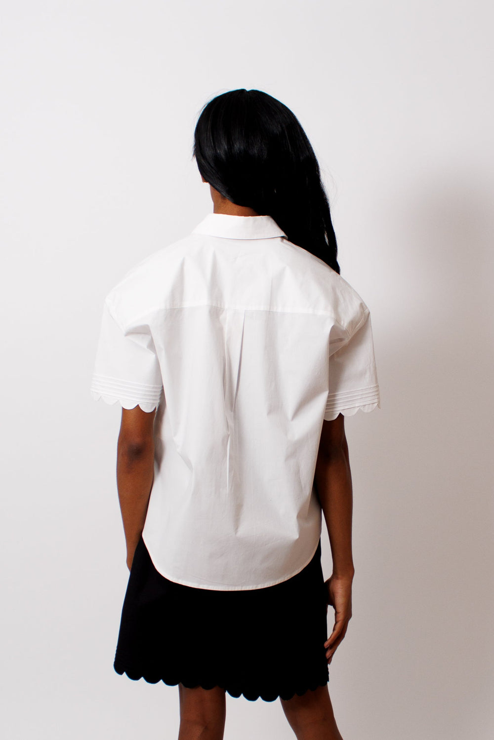 Ja'mes wearing The Garment Cyprus Scallop Shirt rear view 