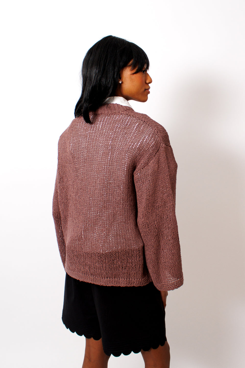 Ja'mes wearing The Garment Literno Sweater rear view