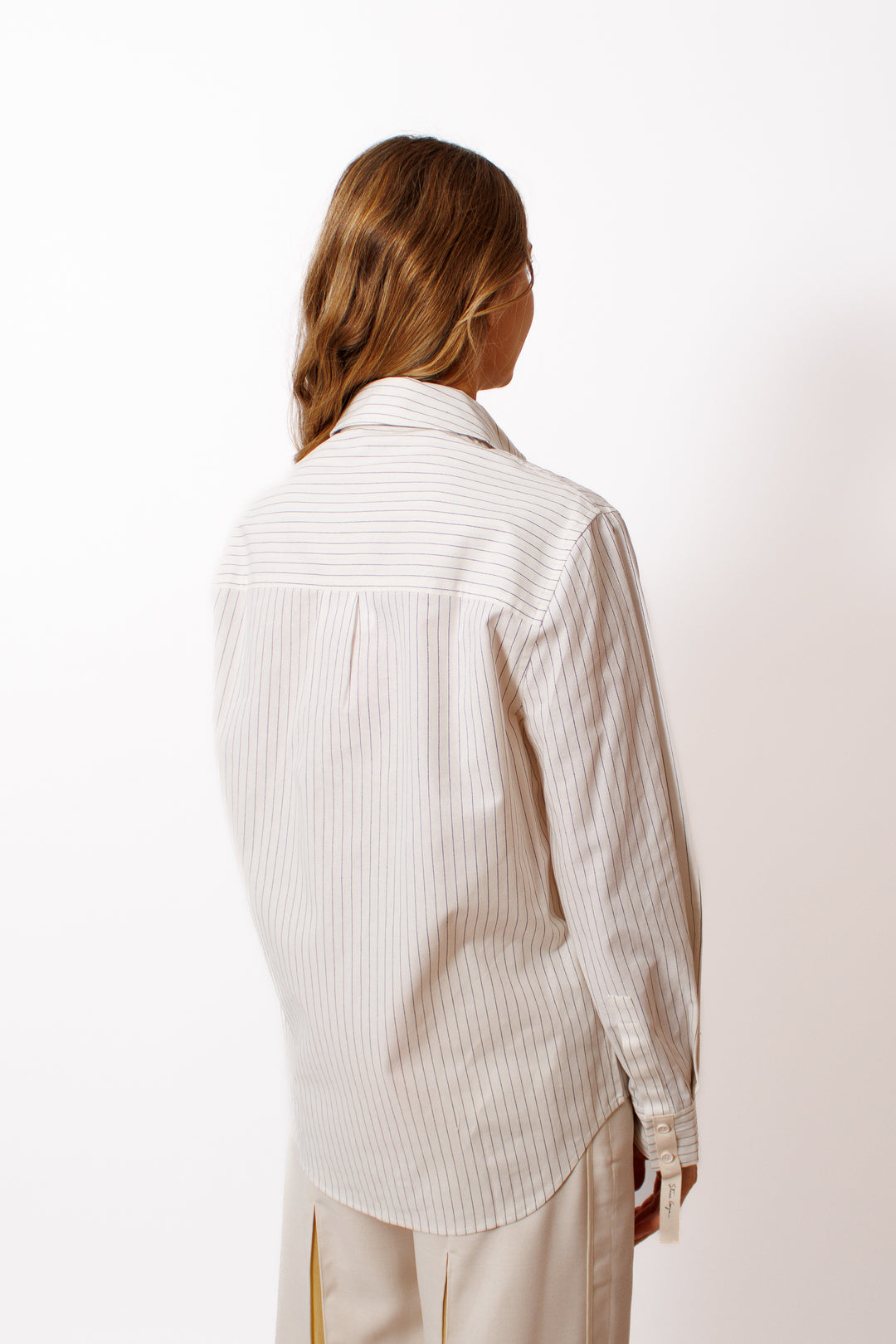 Mari wearing Stine Goya Crisp Stripe Shirting Casual Classic Buttondown Shirt rear view 