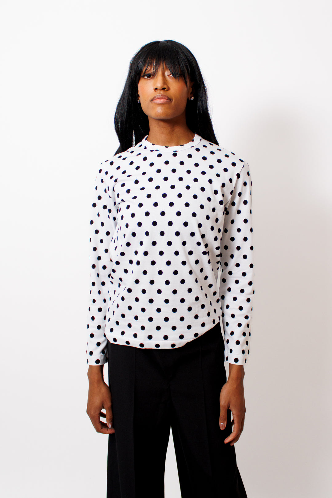 Ja'mes wearing Comme des Garçons Dots For Days Long Sleeve Crew Tee front view