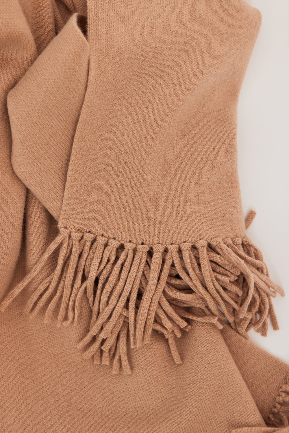 Flat lay of White + Warren Cashmere Blend Tassel Scarf