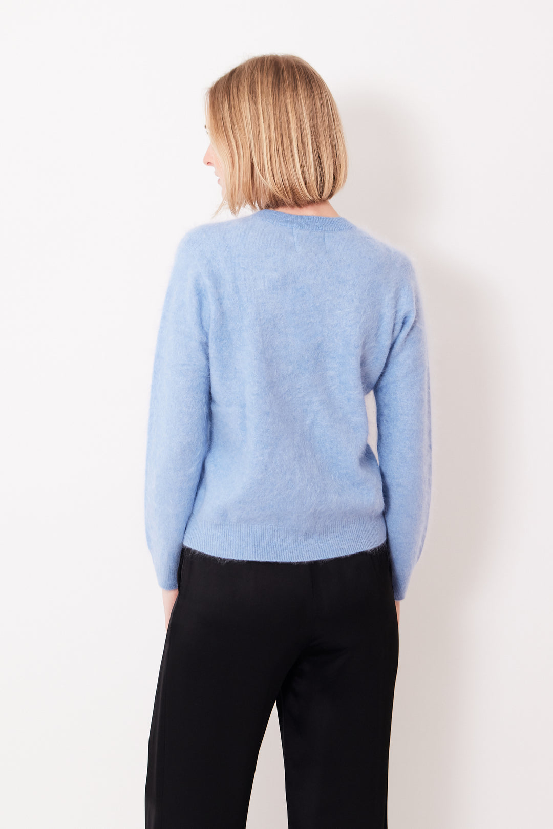 Madi wearing Jumper 1234 Brushed Crew rear view