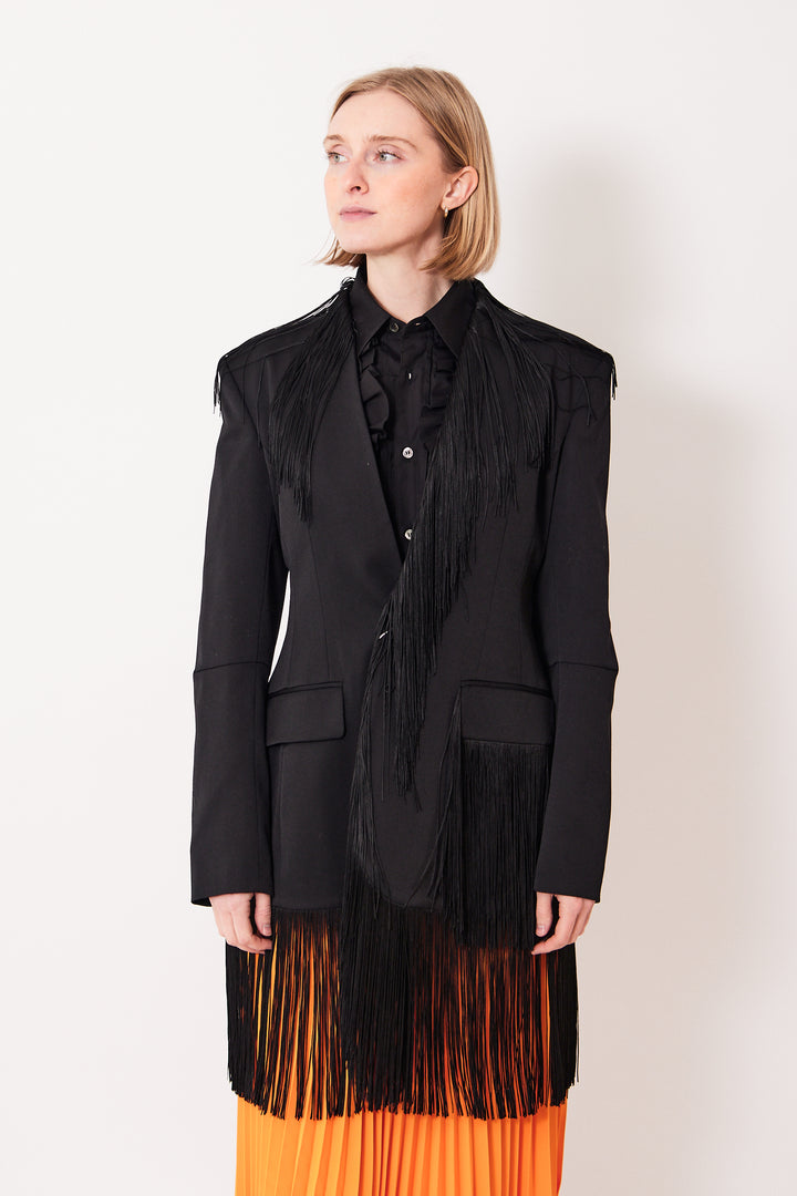 Madi wearing MM6 Maison Margiela Tailoring Wool Fitted Fringe Jacket front view