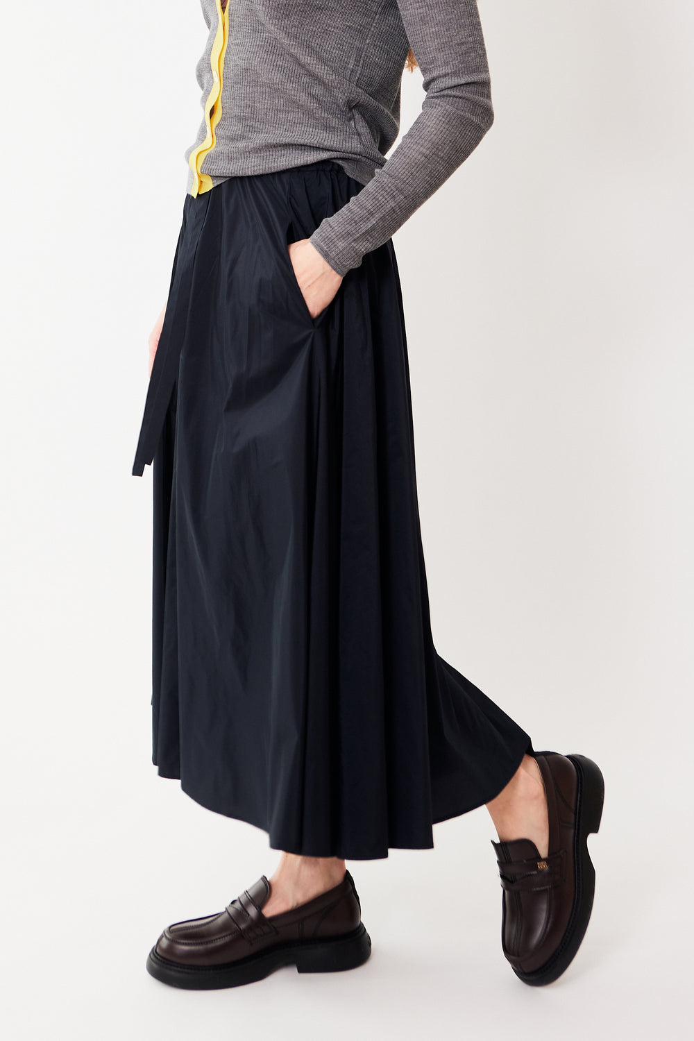 Mari wearing Odeeh Delicate Poly Elasticated Waist Drawstring Skirt front/side view