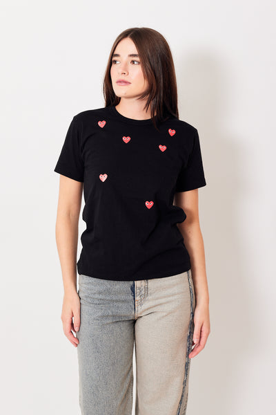Julia wearing Comme des Garçons Many Heart Short Sleeve Logo Print T-Shirt front view