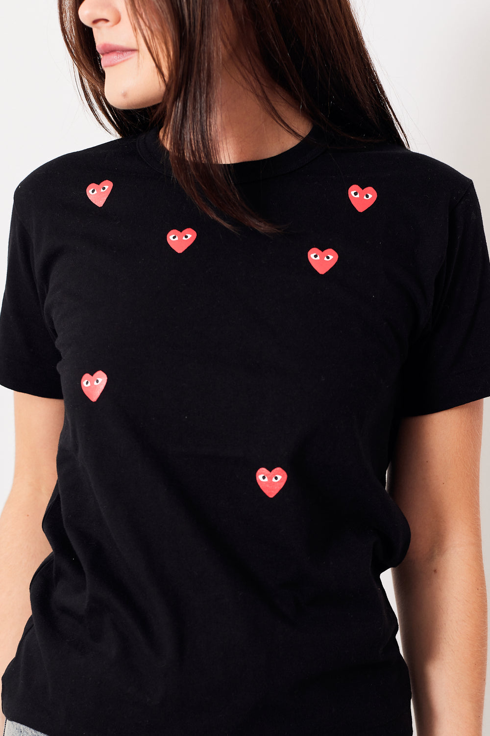 Julia wearing Comme des Garçons Many Heart Short Sleeve Logo Print T-Shirt front view