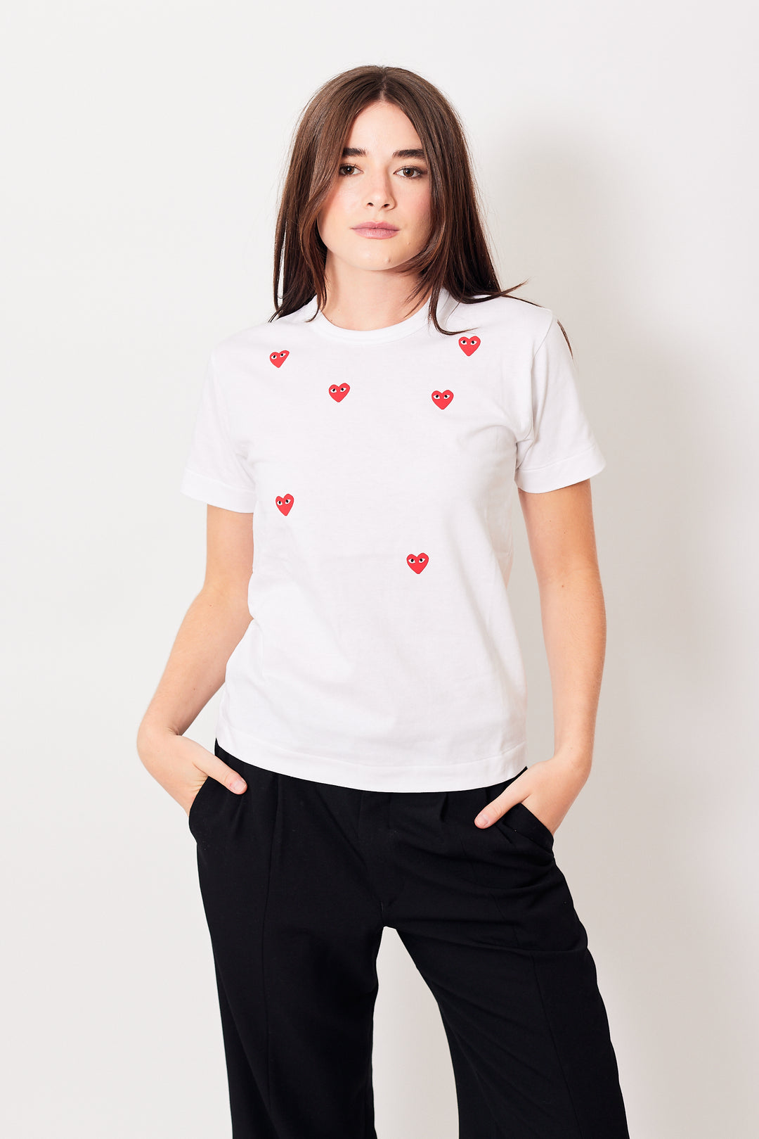 Julia wearing Comme des Garçons Many Heart Short Sleeve Logo Print T-Shirt front view