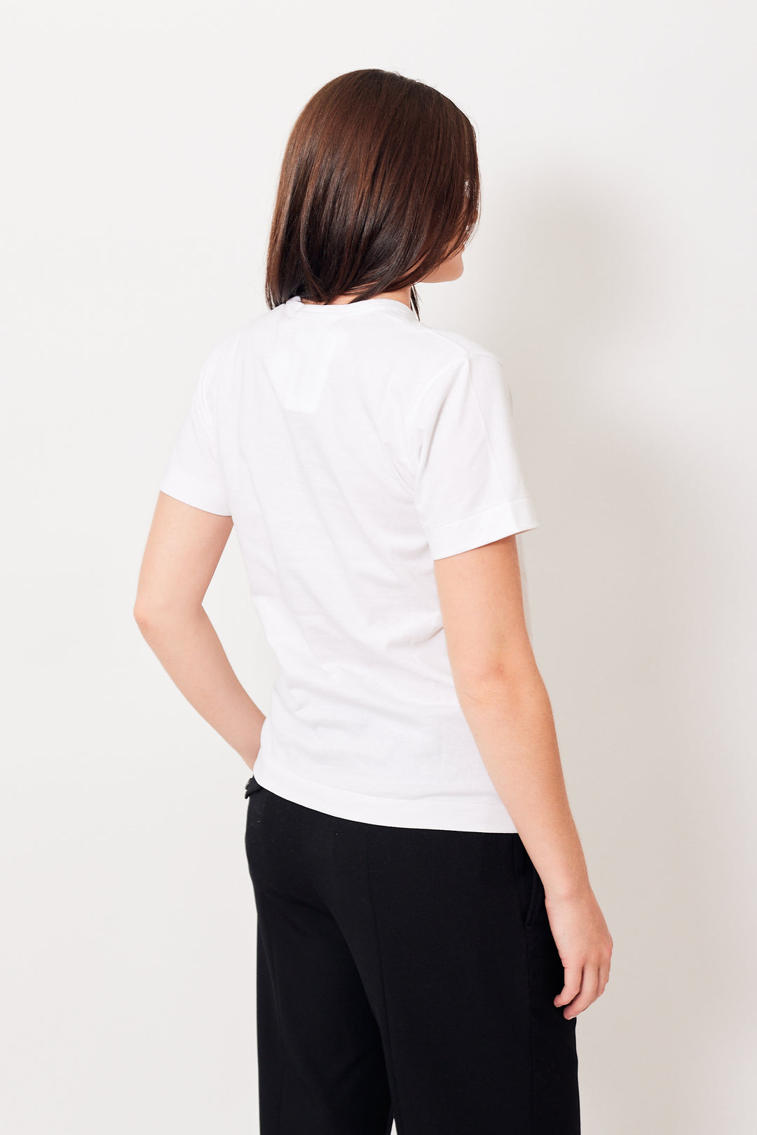 Julia wearing Comme des Garçons Many Heart Short Sleeve Logo Print T-Shirt rear view