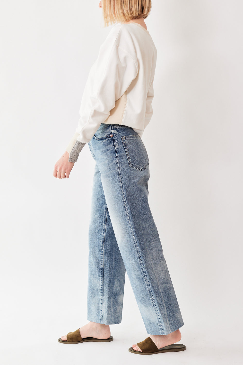 Model wearing Tanaka The Jean Trousers side view