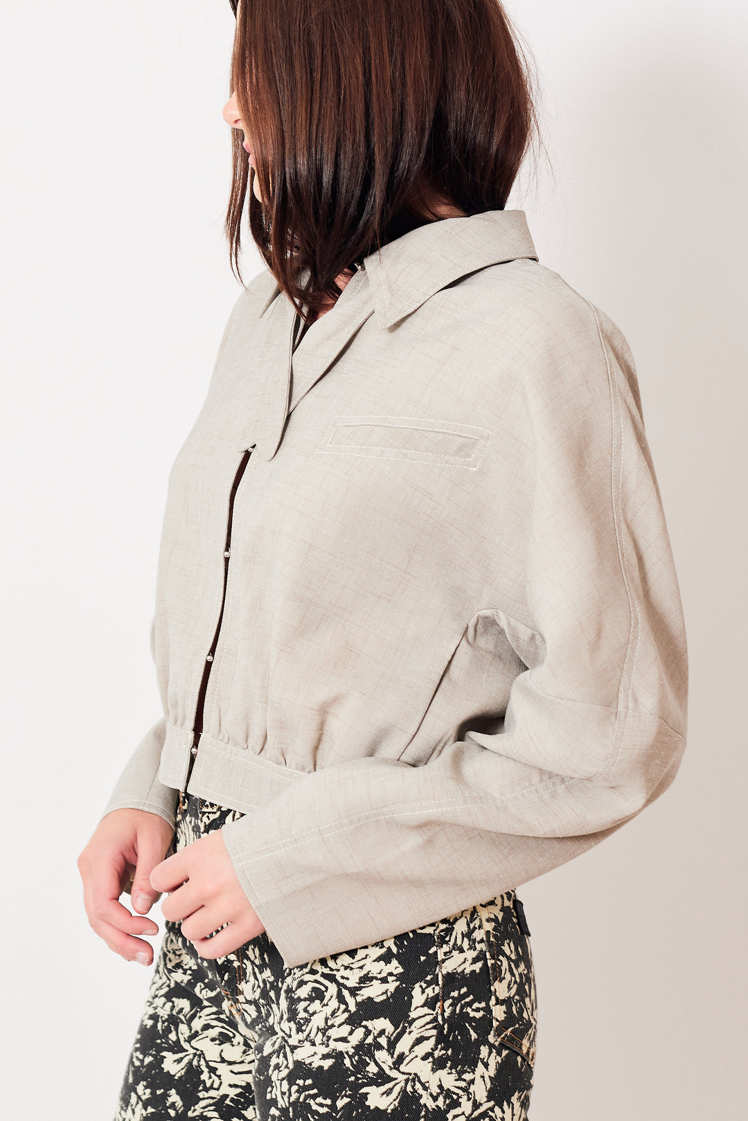 Julia wearing Ganni Light Melange Suiting Short Jacket side view