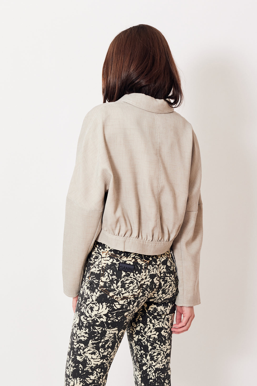 Julia wearing Ganni Light Melange Suiting Short Jacket rear view