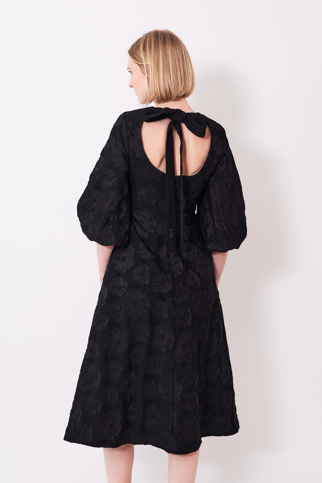 Madi wearing Stine Goya Volume Mid Sleeves Midi Dress rear view