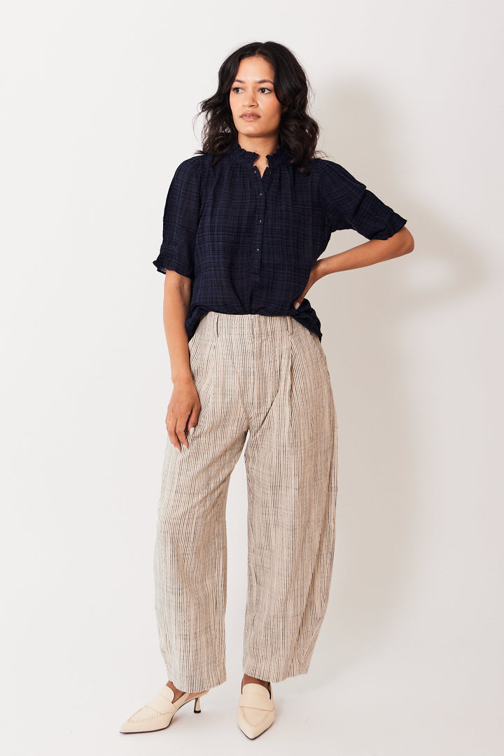 Amanda wearing Apiece Apart Bari Crop Trouser front view