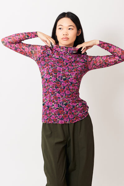 Madelyn wearing Ganni Printed Mesh Long Sleeve Rollneck front view