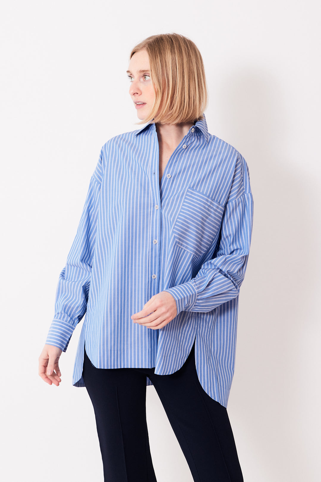 Madi wearing Apiece Apart Aldea Oversized Button Down front view