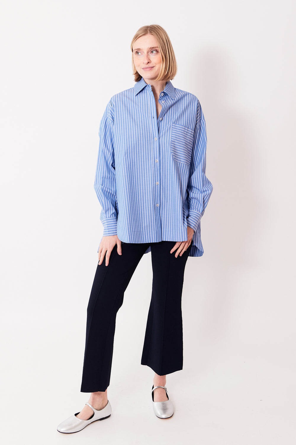 Madi wearing Apiece Apart Aldea Oversized Button Down front view