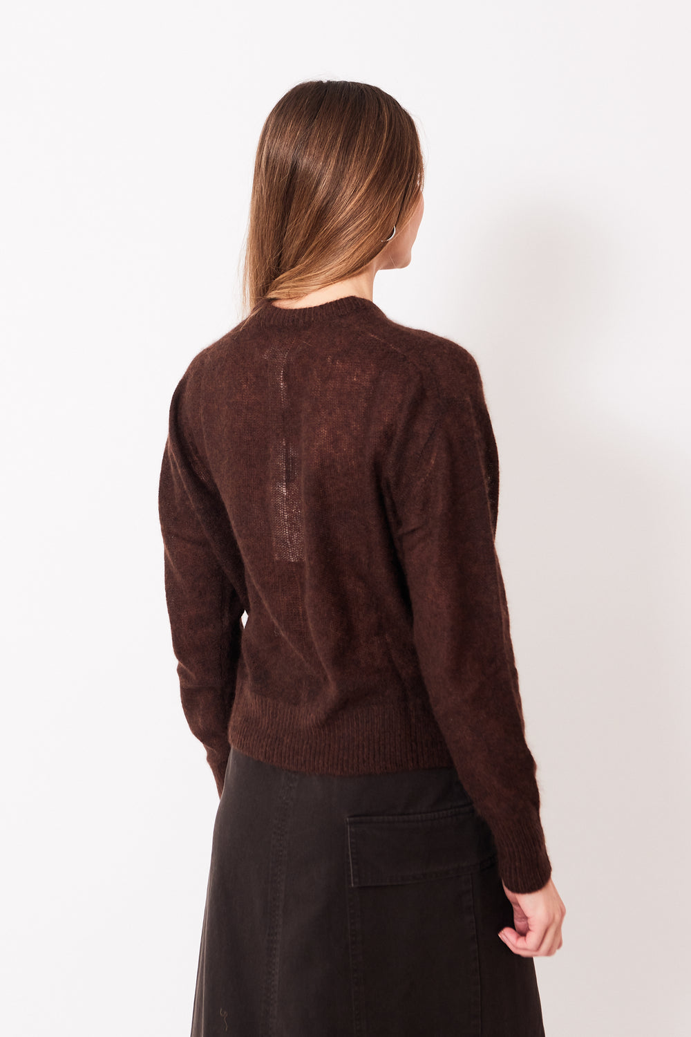 Mari wearing Apiece Apart Softest Tissue Weight Sweater rear view