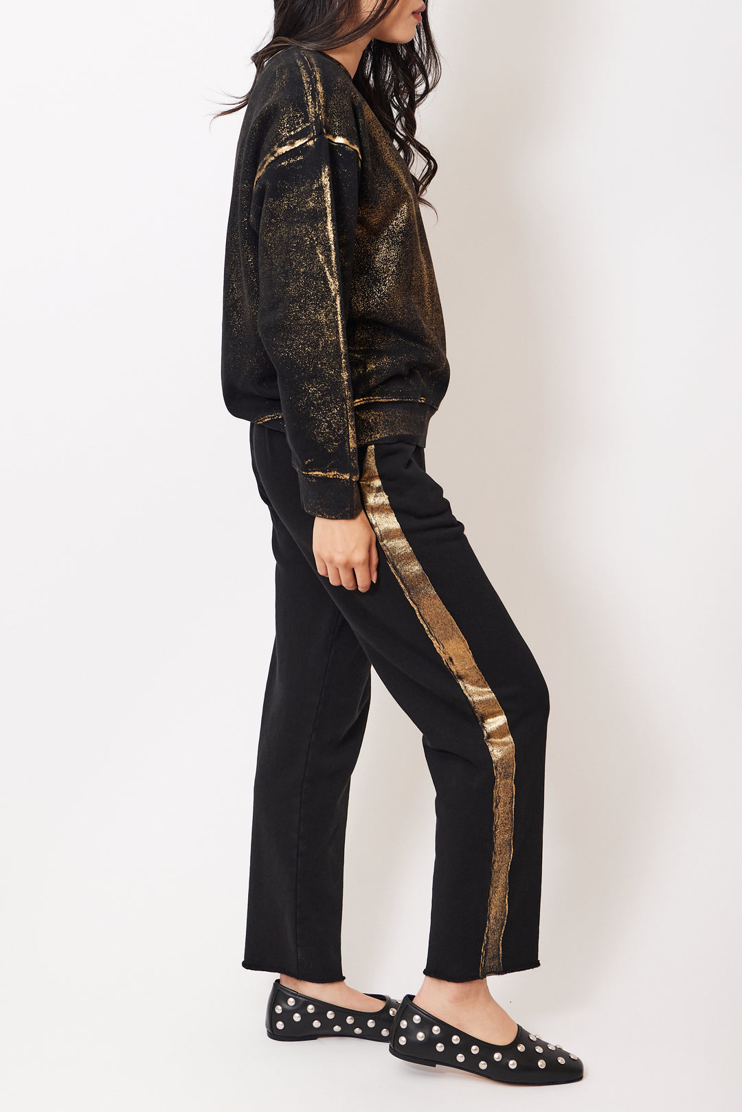 Madelyn wearing Raquel Allegra Tira Sweatpant side view