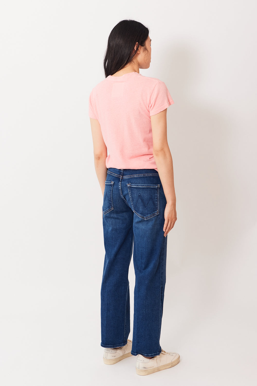 Madelyn wearing Mother Denim The Mid Rise Rambler Zip Ankle rear view