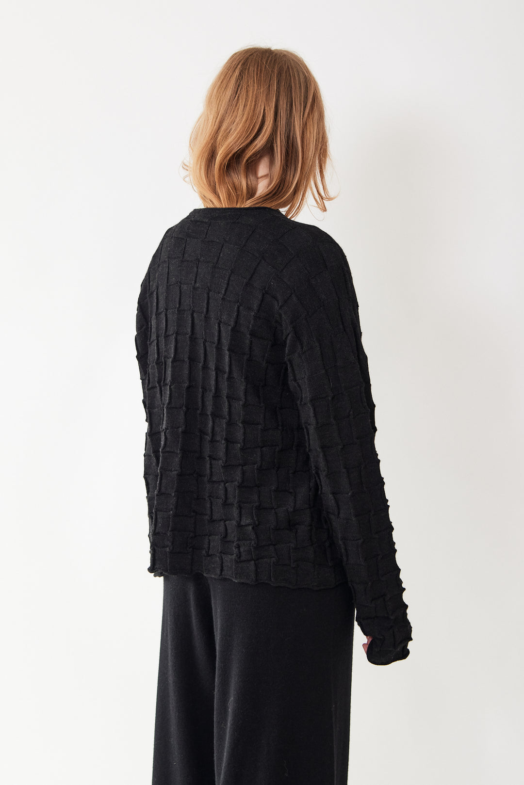 Waverly wearing Lauren Manoogian Inlay Cardigan rear view