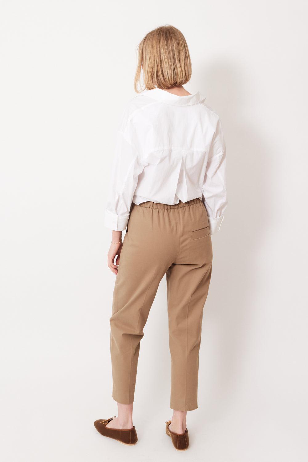 Madi wearing Tela Kilo Trousers rear view