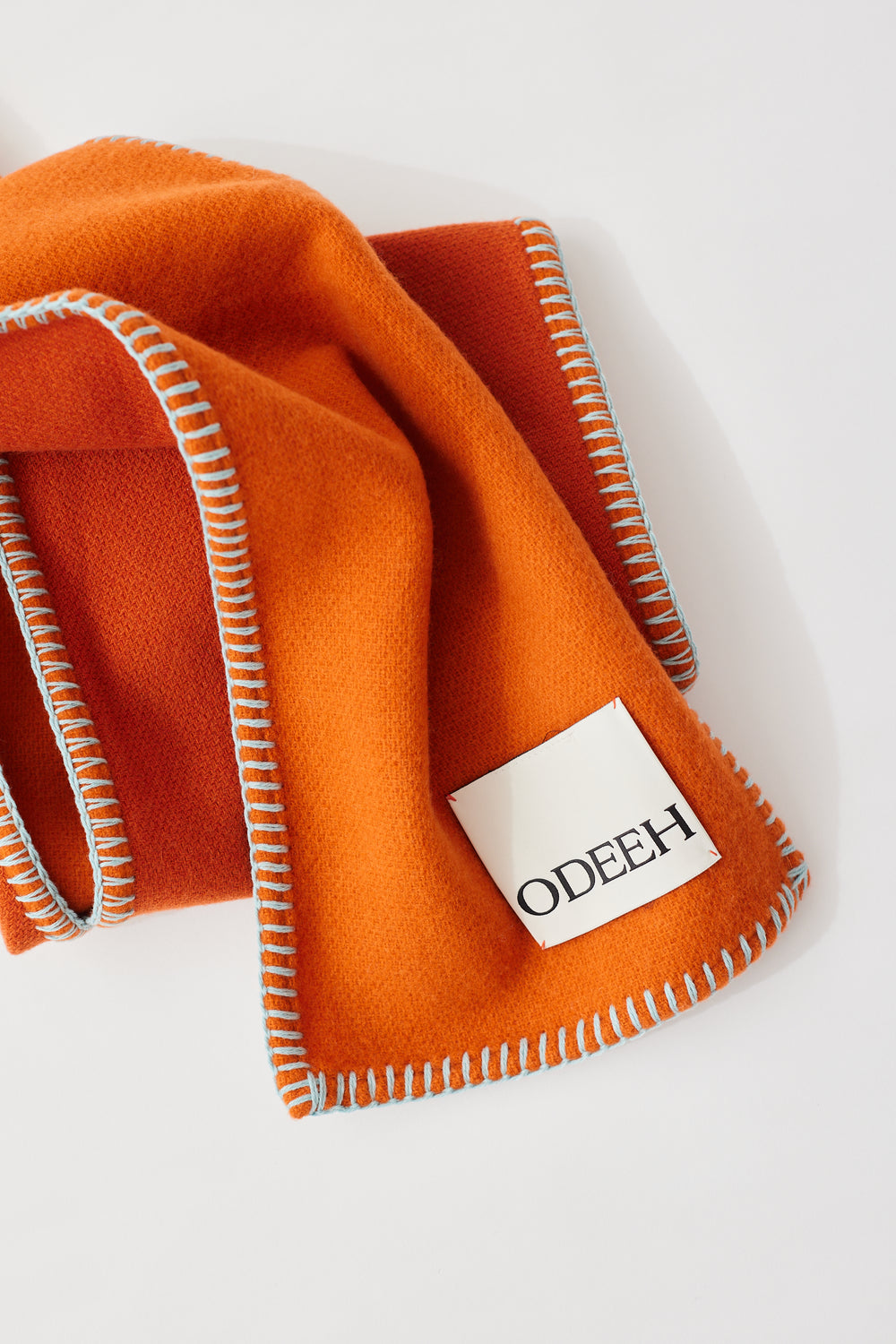 Flat lay of Odeeh Whipstitched Wool Cashmere Scarf 