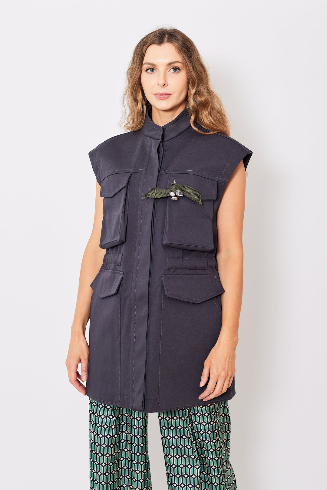 Mari wearing Odeeh Utility Coat Vest With Pin front view