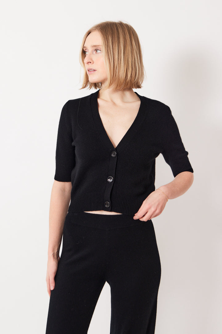 Madi wearing Allude Half Sleeve Cashmere V Cardigan front view