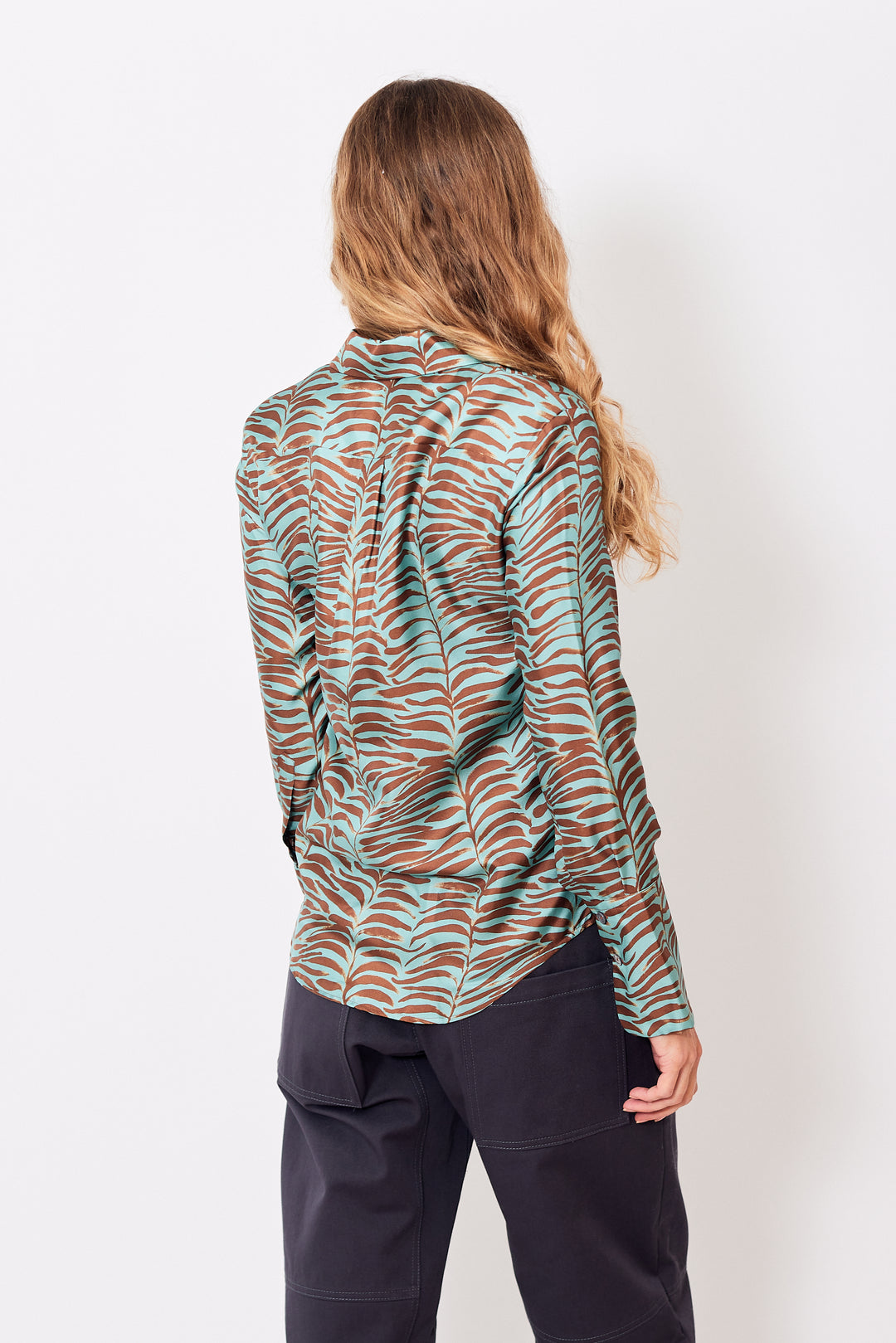 Mari wearing Odeeh Silk Botanical Blouse rear view