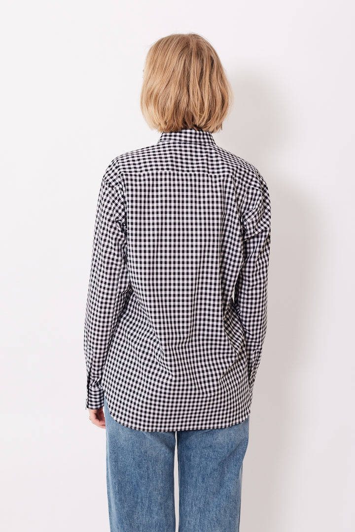 Madi wearing Comme des Garçons Mens Woven Forever Shirt rear view