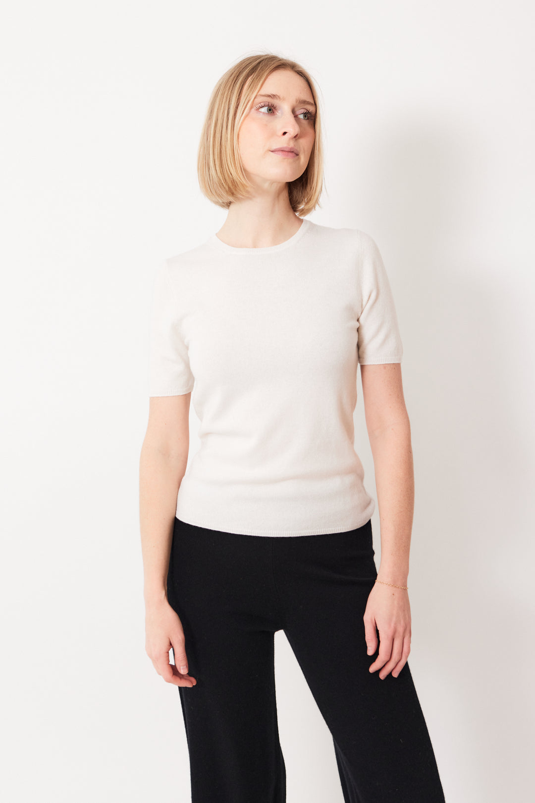 Madi wearing Allude Quarter Sleeve Cashmere Crew Sweater front view