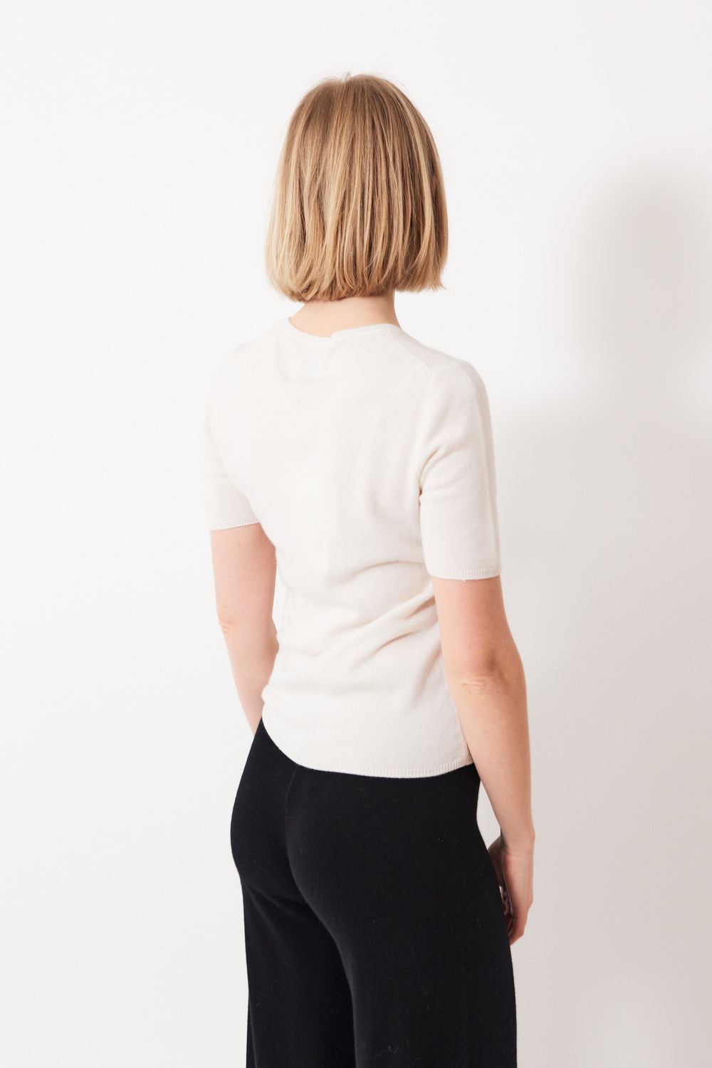 Madi wearing Allude Quarter Sleeve Cashmere Crew Sweater rear view