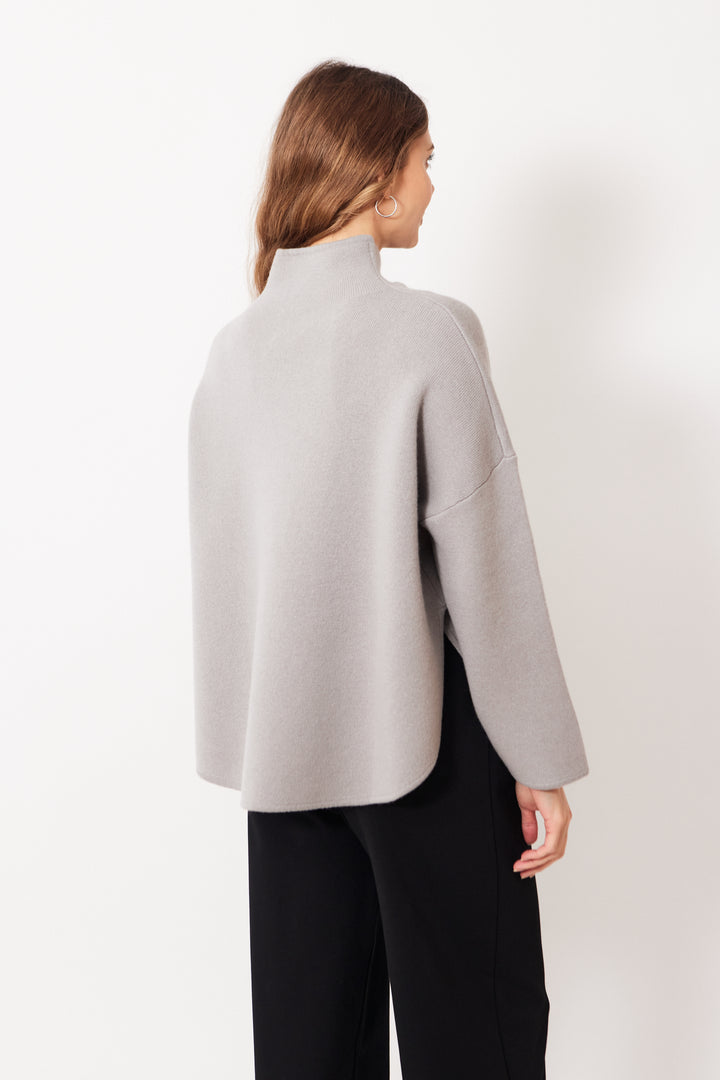 Mari wearing Allude Mock Neck Virgin Wool Cashmere Blend Sweater rear view