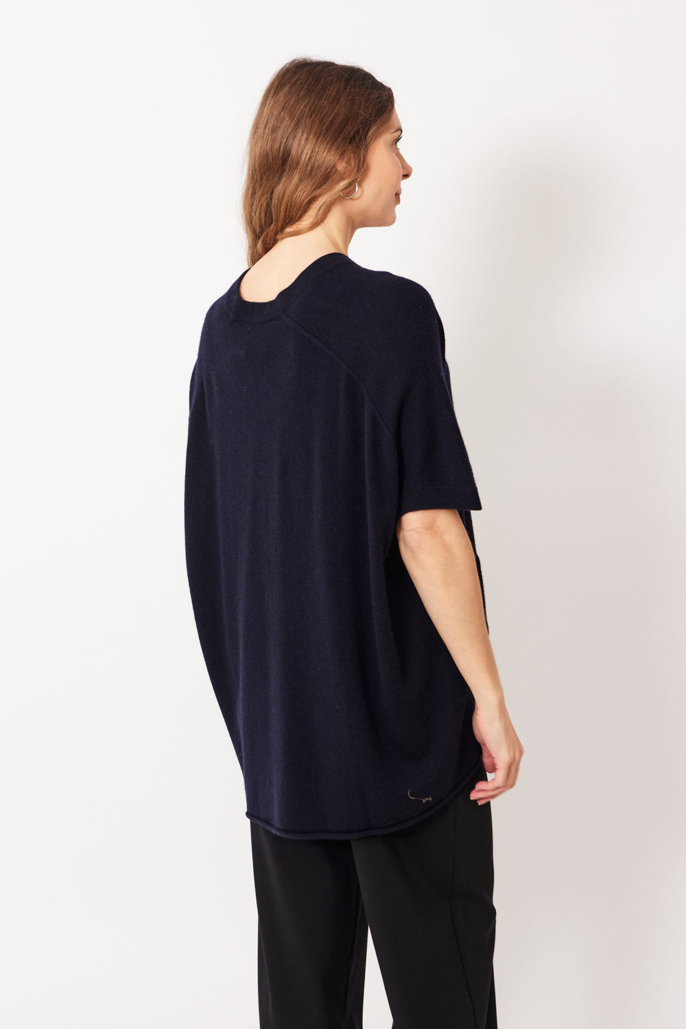 Mari wearing Allude Oversized Drop Sleeve V Vest rear view