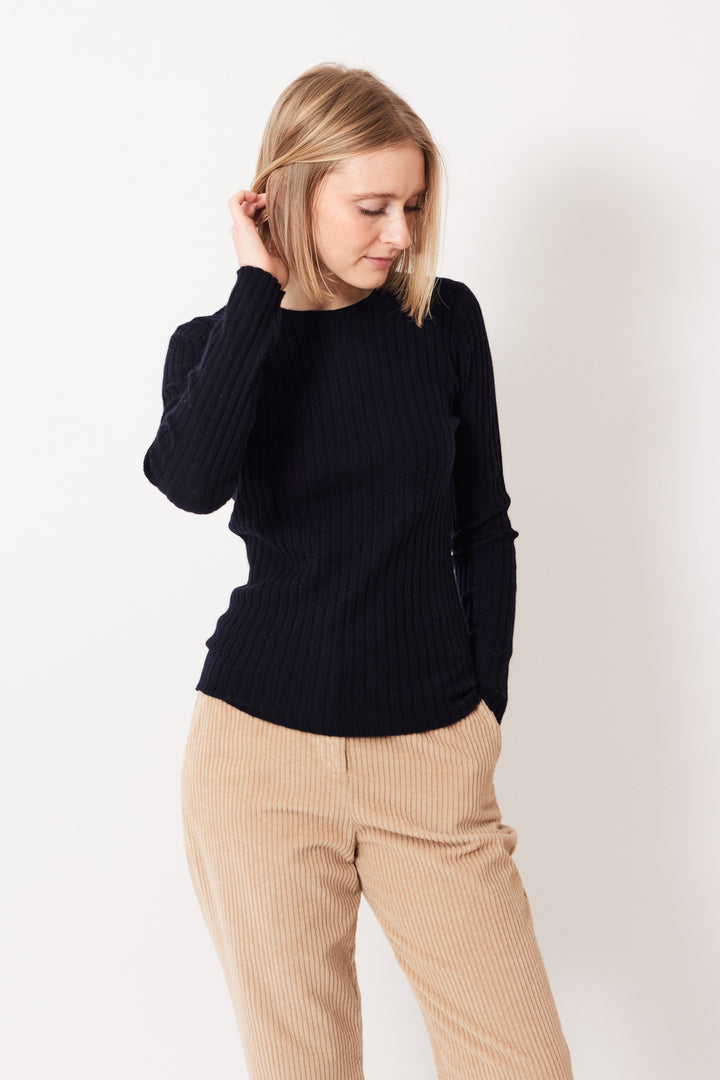 Madi wearing Allude Ribbed Cashmere True Joy Sweater front view