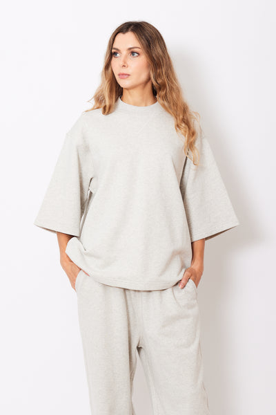 Mari wearing Sofie D'Hoore Thebe Oversized Short Sleeve Cropped Sweatshirt front view