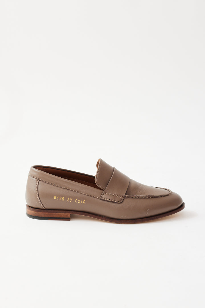 Flat lay of Common Projects Ballet Loafer side view