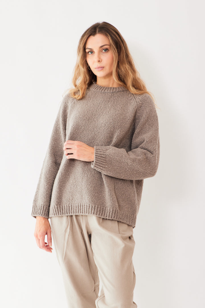 Mari wearing Evam Eva Renew Wool Raglan Pullover front view