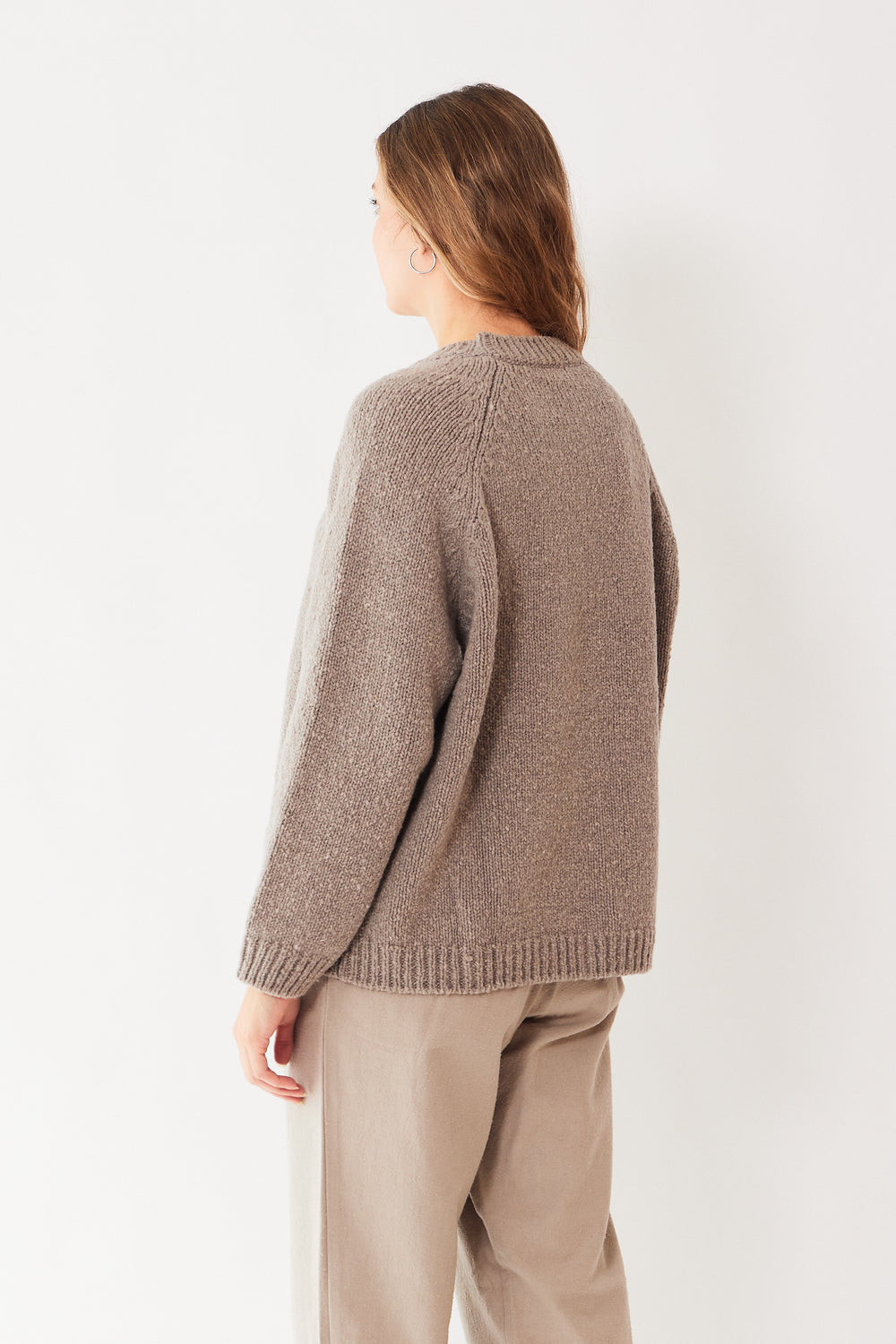 Mari wearing Evam Eva Renew Wool Raglan Pullover rear view