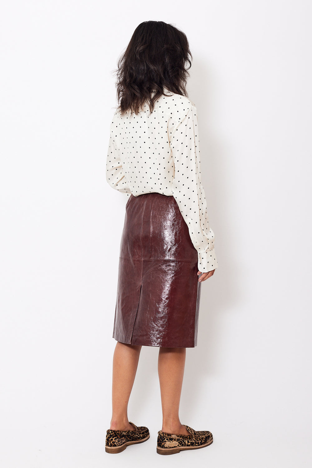 Amanda wearing Seventy Front And Back Split Leather Skirt rear view