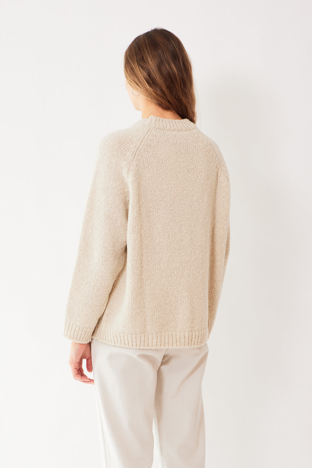 Mari wearing Evam Eva Renew Wool Raglan Pullover rear view