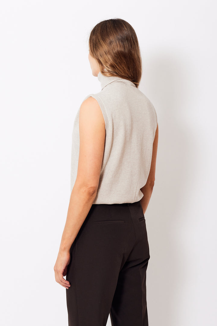 Mari wearing Seventy Sleeveless T Neck Cardigan Set rear view