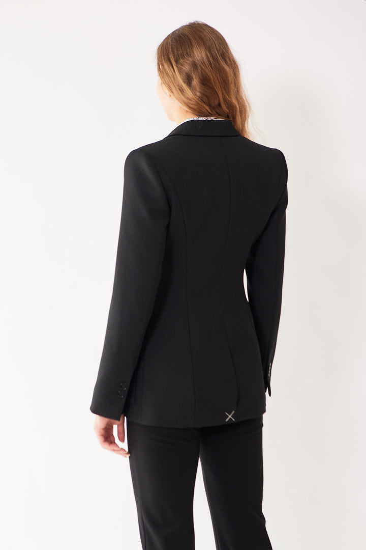 Mari wearing Dorothee Schumacher Refreshing Ambition Jacket rear view