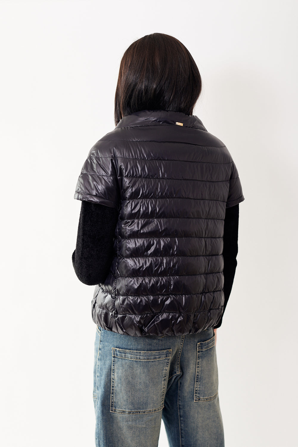 Julia wearing Herno Emilia Cape Jacket rear view