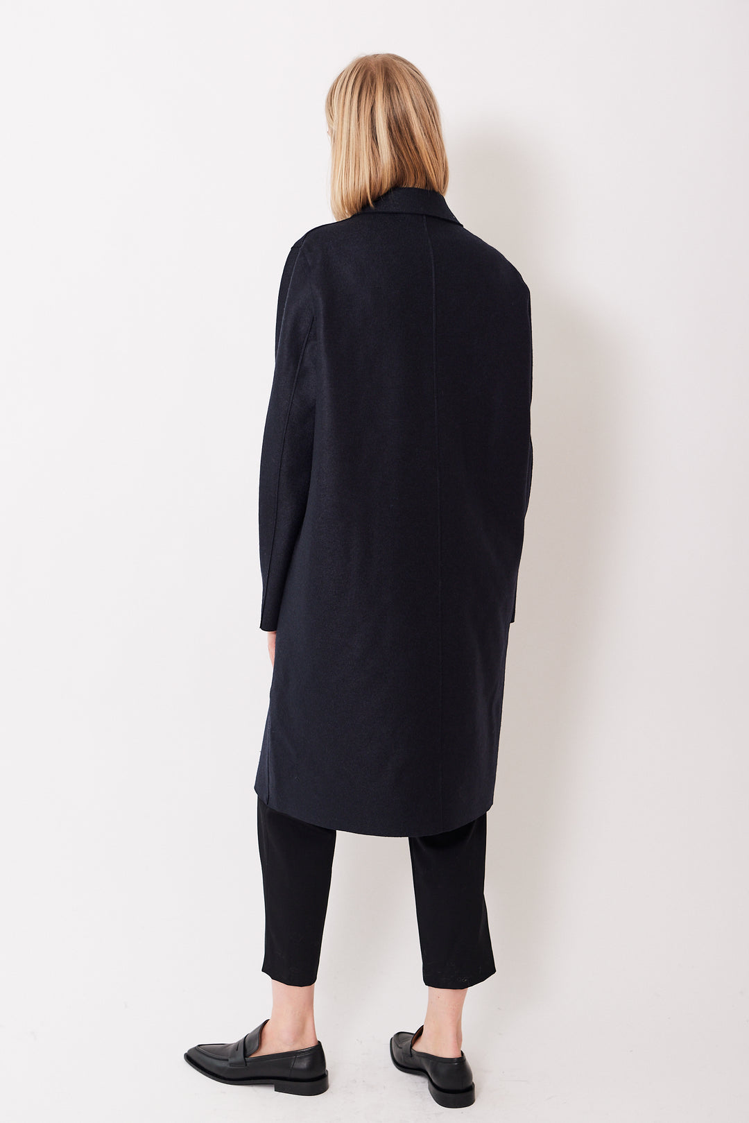 Madi wearing Harris Wharf Pressed Wool Overcoat With Liberty Quilted Lining rear view