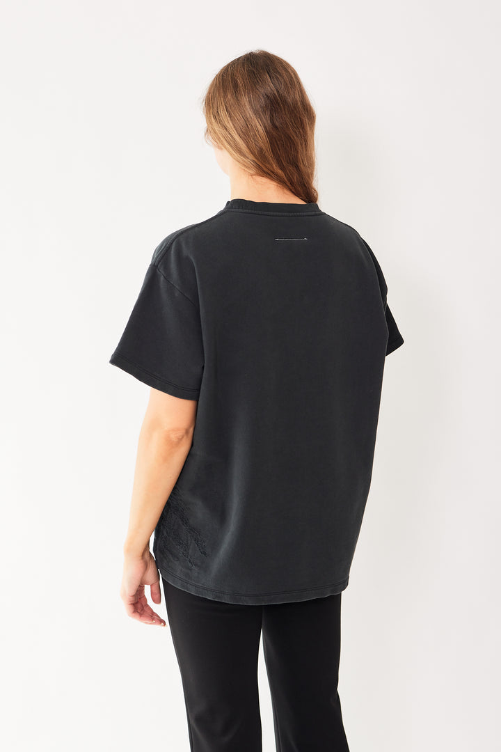 Mari wearing MM6 Maison Margiela Diagonal Zip Pocket Tee Sweatshirt rear view