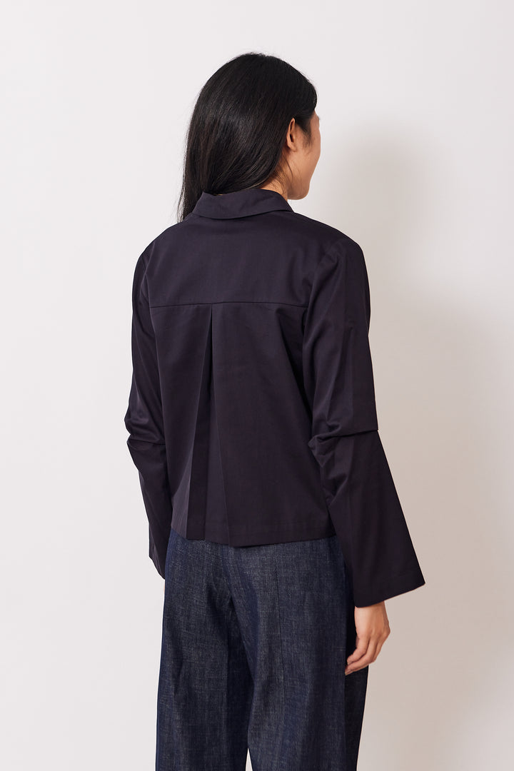 Madelyn wearing Zero + Maria Cornejo Cotton Broadcloth Biker Shirt Black rear view