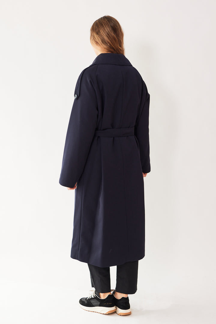 Mari wearing Herno Reversible Twill To Shiny Nylon Long Coat With Belt rear view