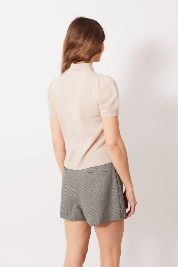 Mari wearing Allude Polo Neck Quarter Sleeve Cashmere Sweater rear view