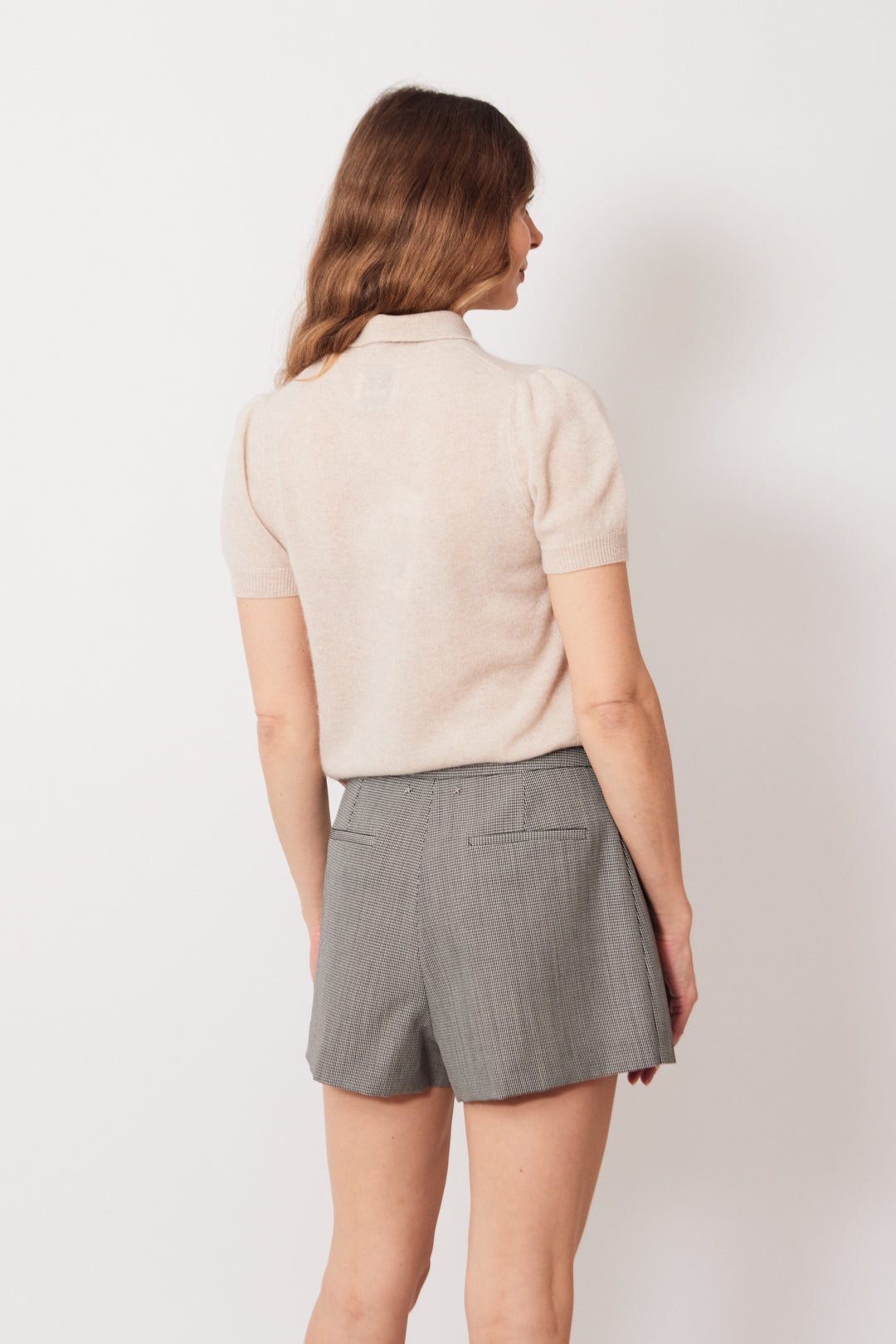 Mari wearing Golden Goose Nina Wrap Mini Skorts Black rear view